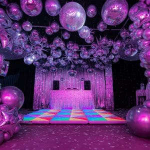70s silver disco theme illuminated LED dance floor and mirror balls - styling a disco party