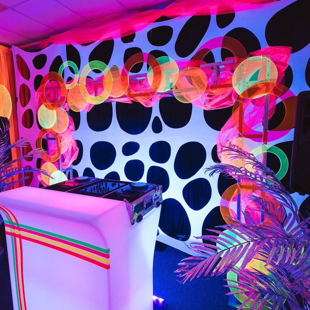 DJ booth at neon themed event