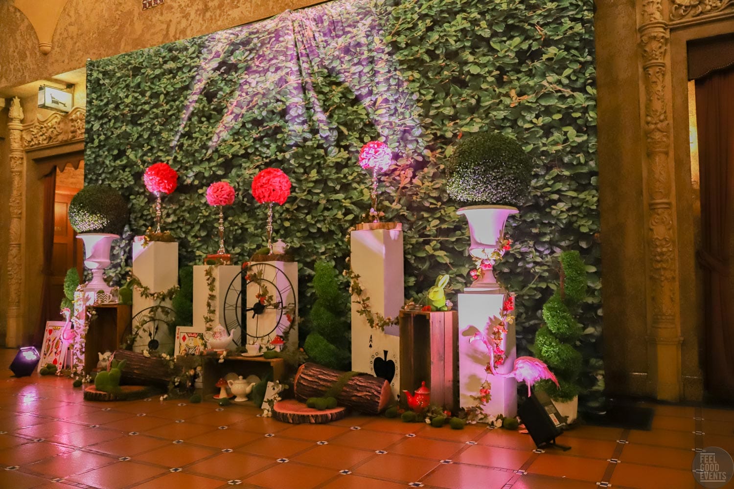 alice in wonderland themed event artificial plants and flowers, and backdrop