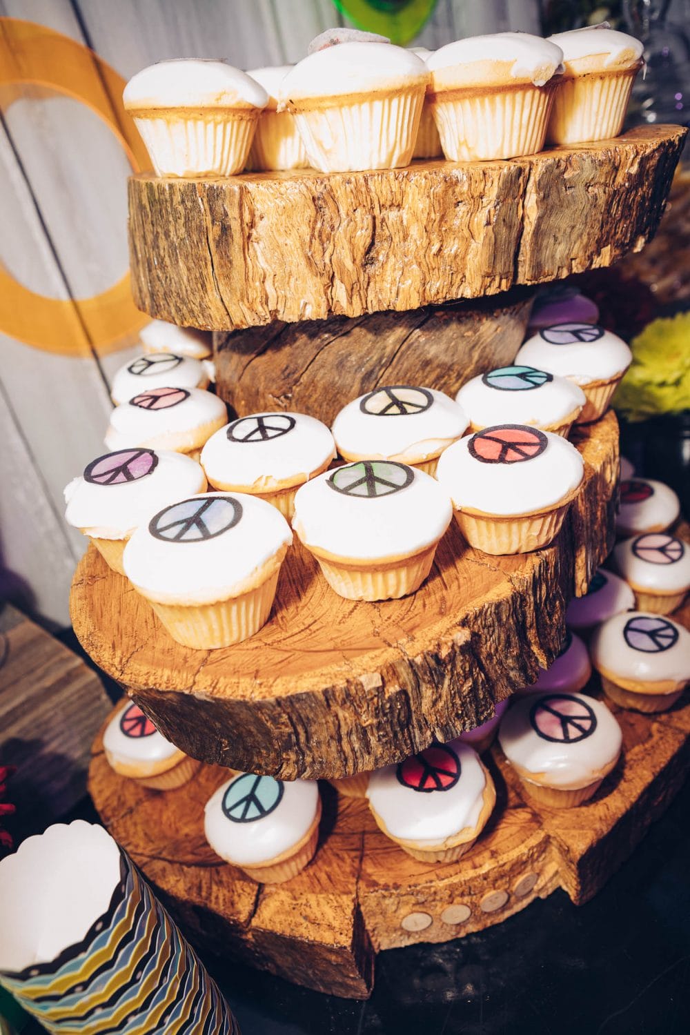 60s themed cupcakes on cake stand