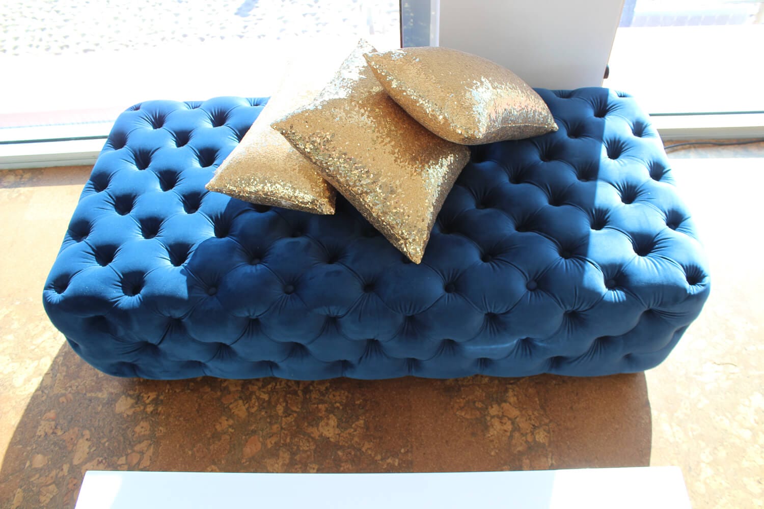 Blue Velvet Ottoman Hire Melbourne with Gold Pillows