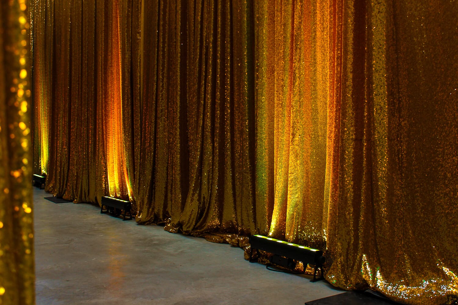 led strip light infront of gold sequin drape hire melbourne