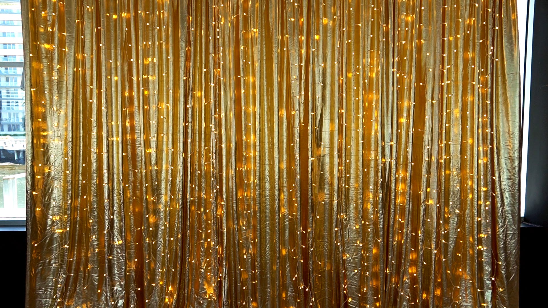 Gold metallic drape with fairy lights
