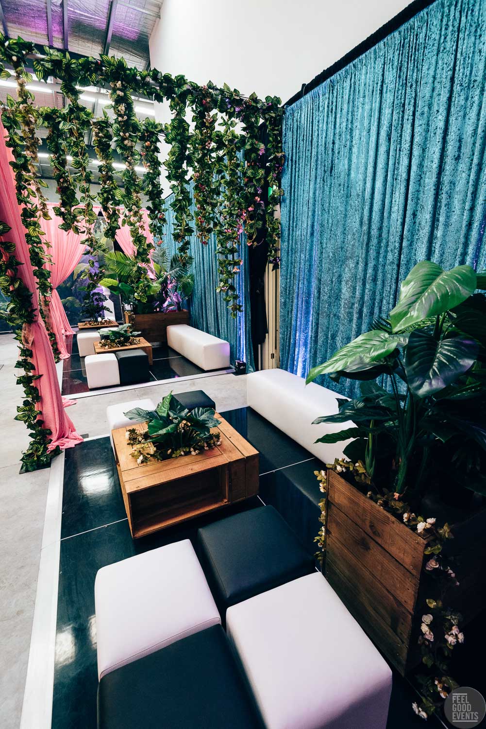 alice in wonderland themed event lounge furniture and artificial plants