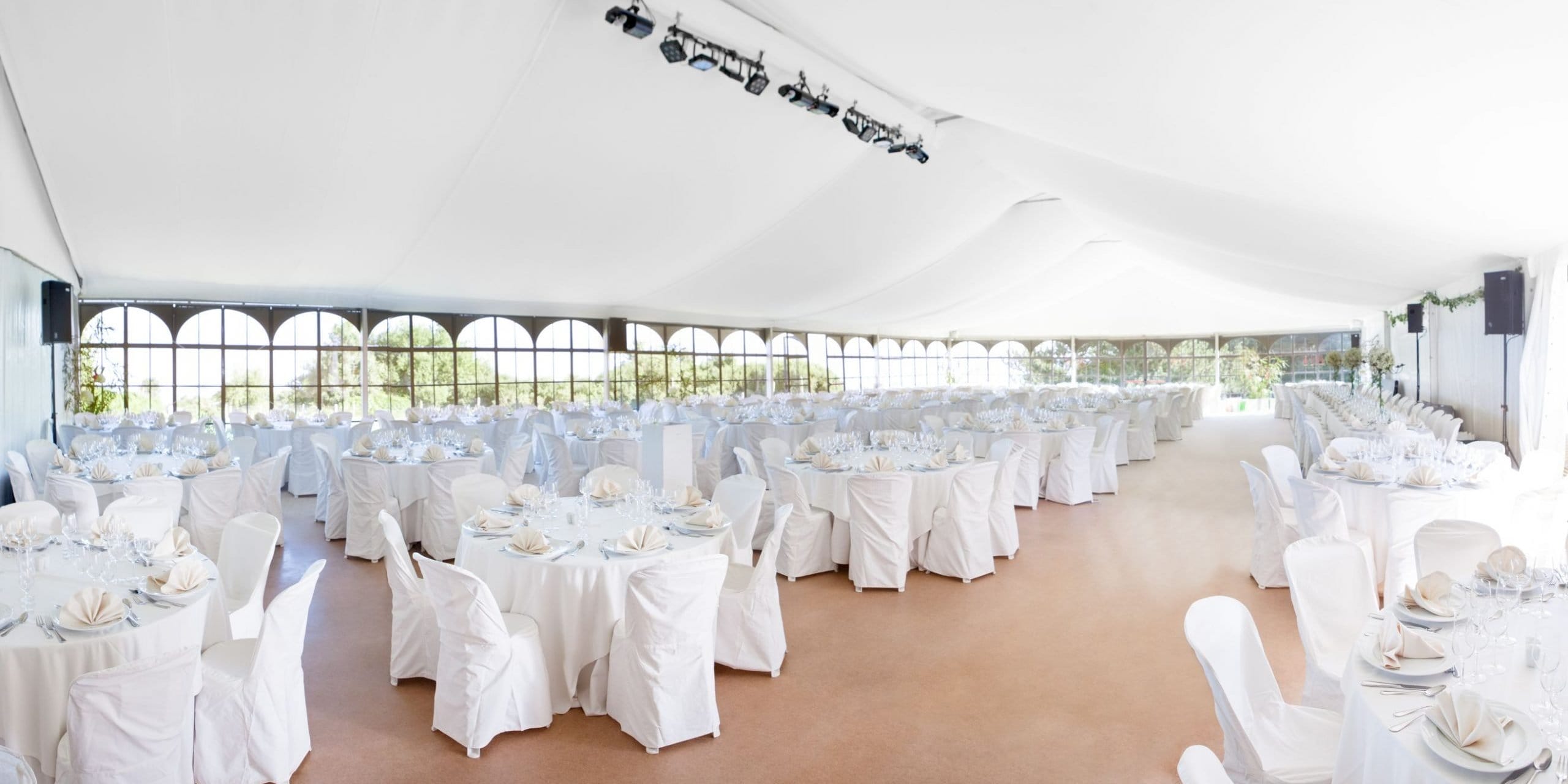 marquee set up with silk roof lining in white