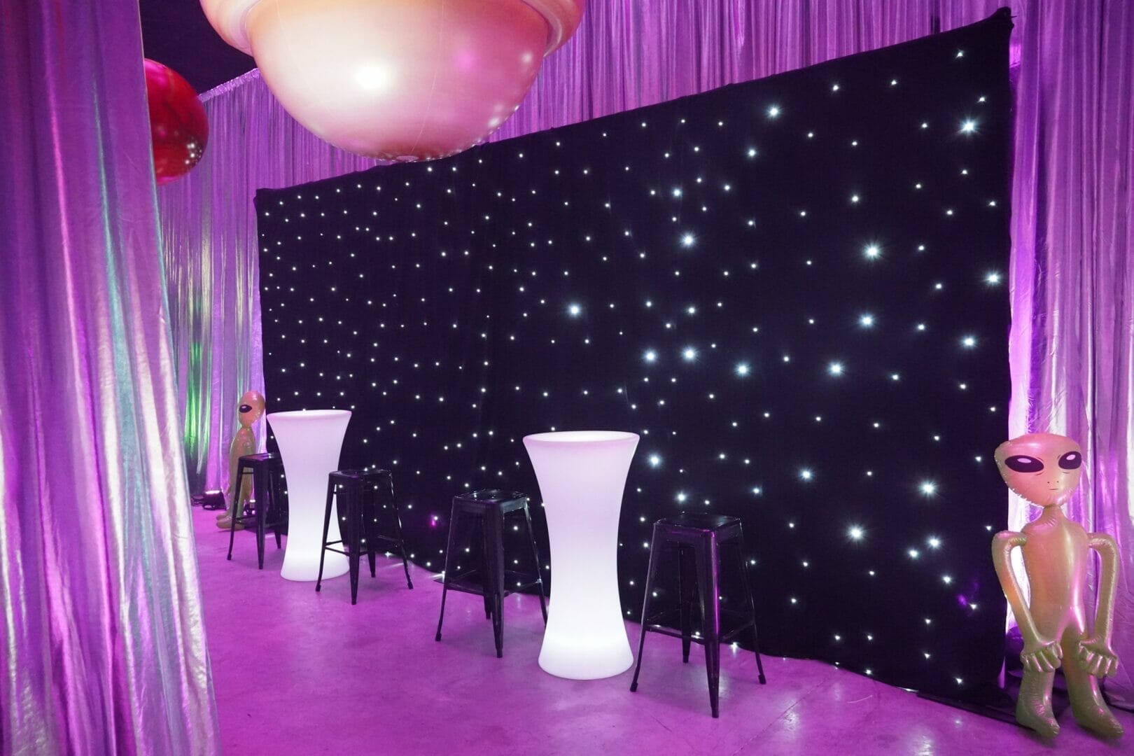 Starlight cloth drape and led furniture at space themed party
