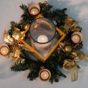 gold wreath and candle vase christmas centrepiece