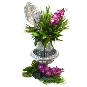 silver, purple, and green floral centrepiece with mirror balls