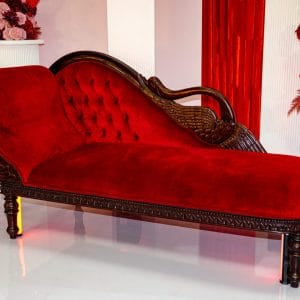 red love seat in styled valentine's day shoot