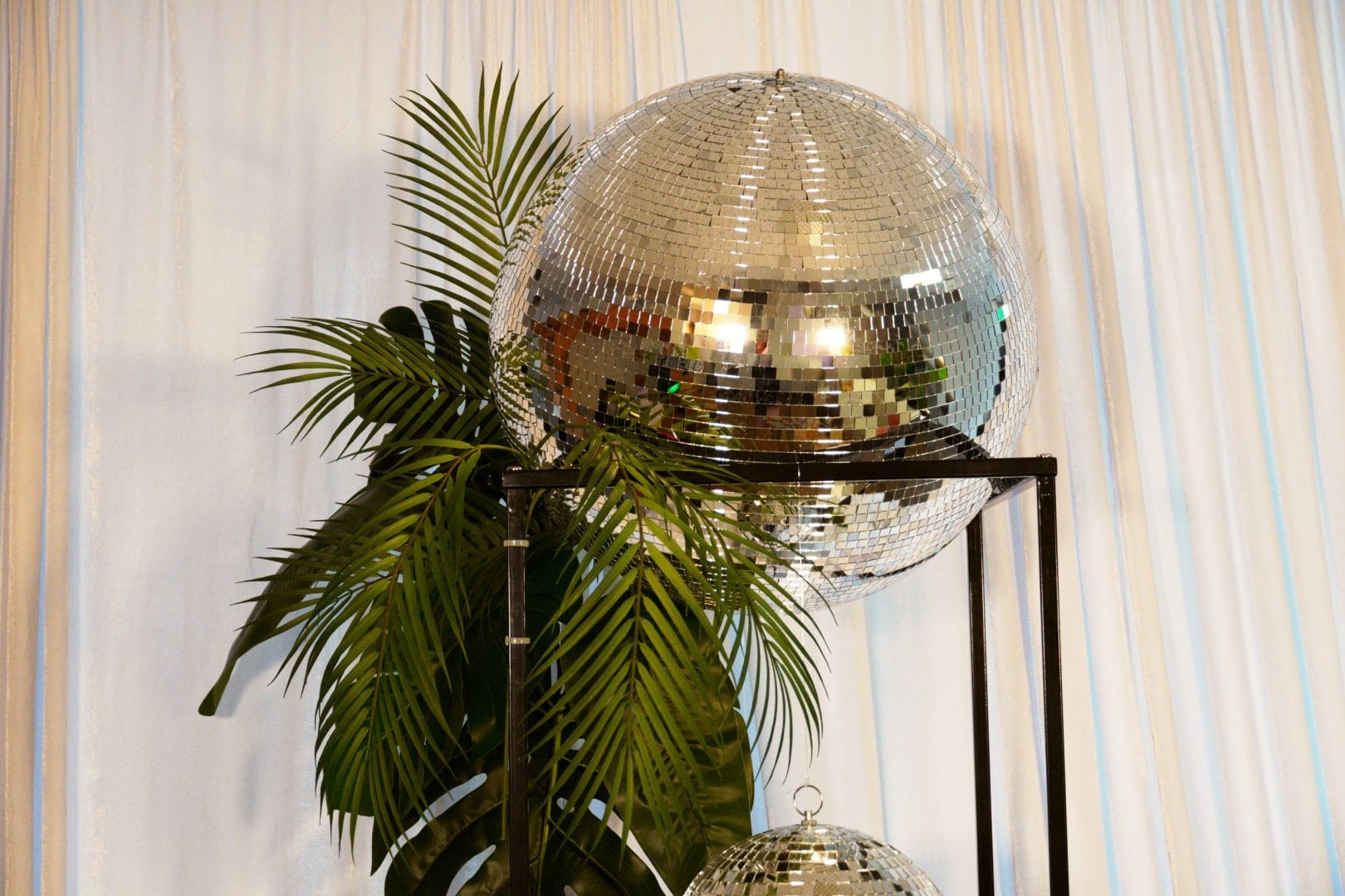 silver mirror ball and greenery