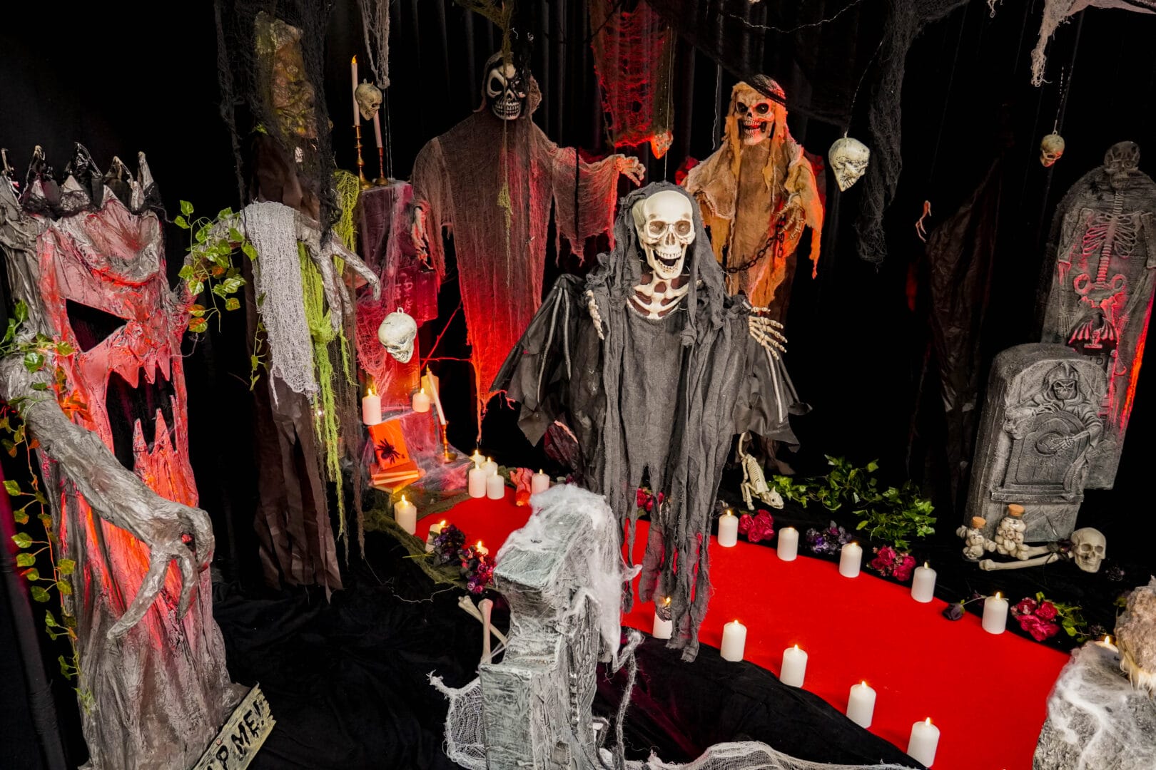 themed halloween hanging props. red carpet, candles