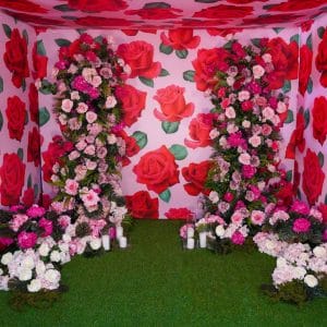 floral pod photo backdrop with pink floral installations