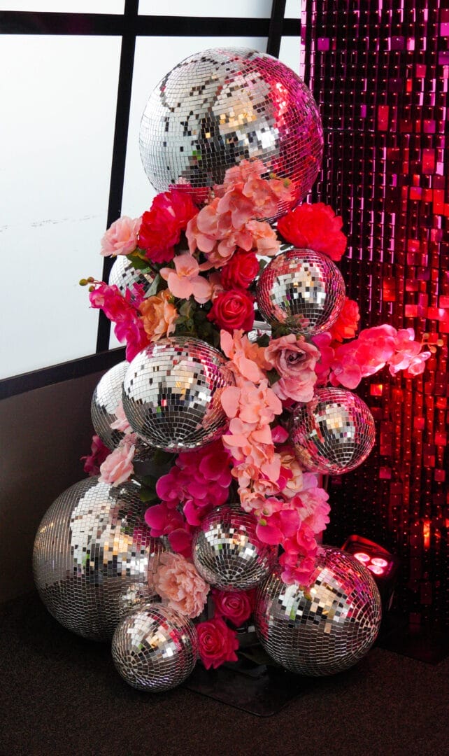 Pink florals and silver mirror ball display